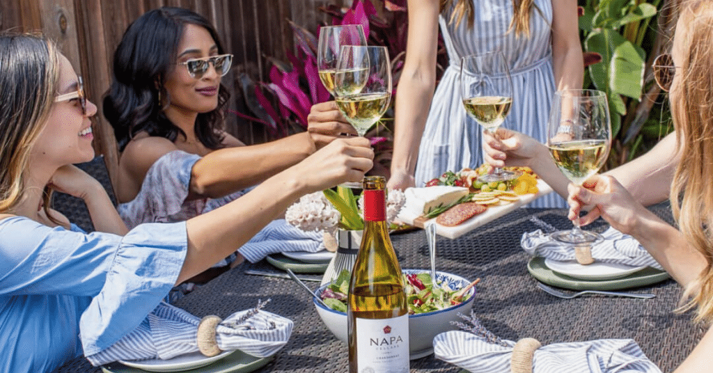 A group of ladies raising glasses and enjoying the Napa Cellars Chardonnay