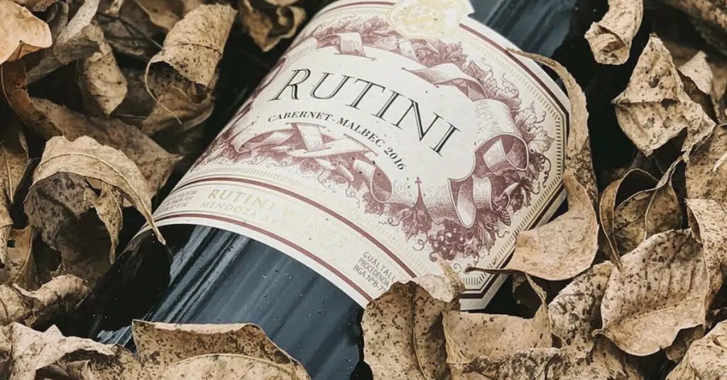 A bottle of Rutini Cabernet Malbec on the ground